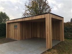 Modern houten tuinhuis met plat dak