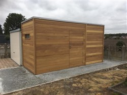 Blokvormig modern tuinhuis met plat dak